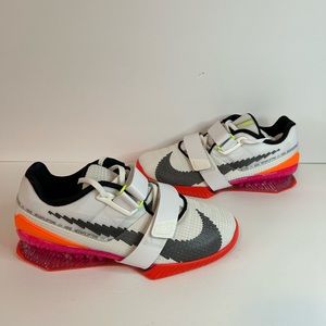 Nike White and Black Athletic Shoes with Red and Orange Highlights